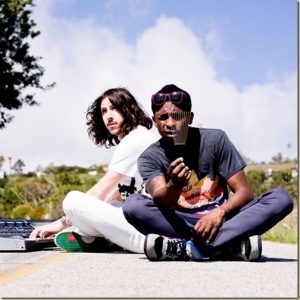 Shwayze posing with producer Cisco Adler during a photoshoot