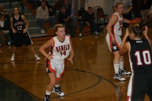 Senior Captain Brooke Waite plays defense against the opponent.