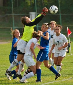 Junior goalie Tabitha Michaelidis makes a stop.