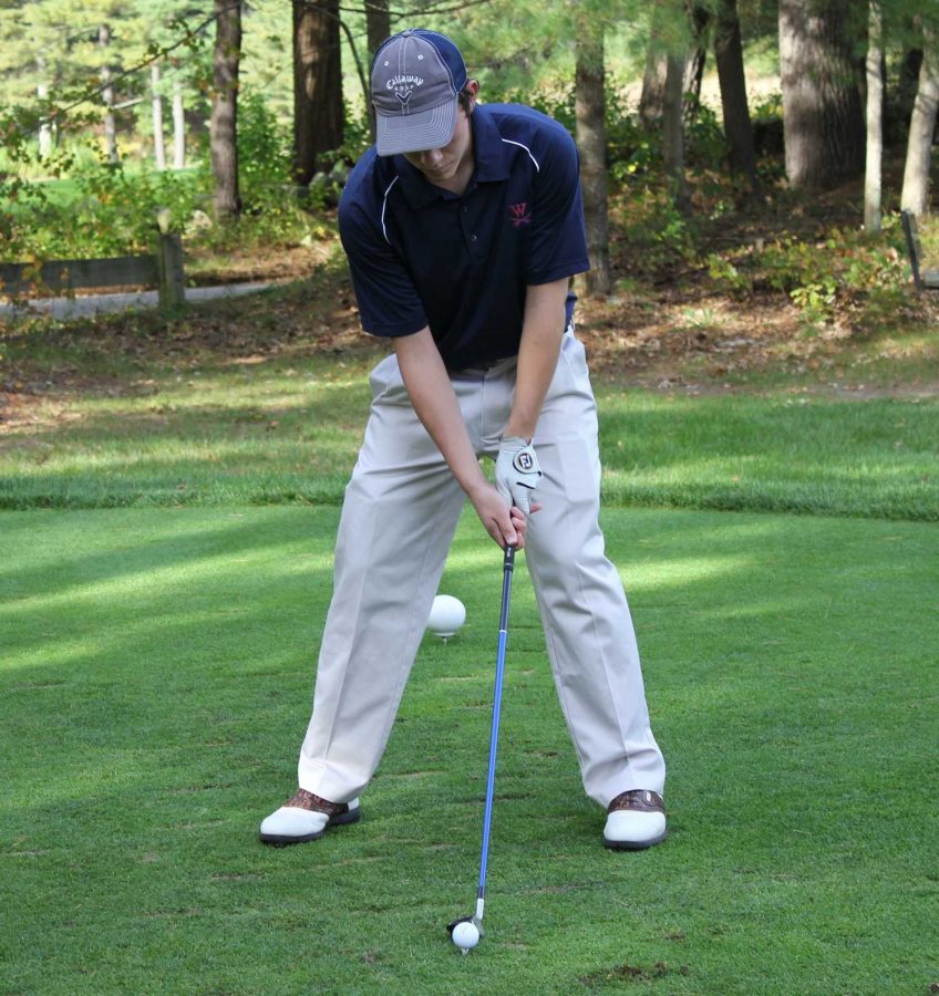 Walpole Golfer lines up for a drive.