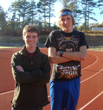 The two top runners of the cross country team pose for a picture.