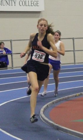 A Walpole runner leads in the mile race.