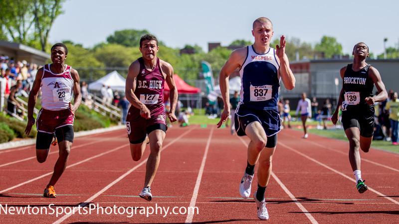 A Walpole runner competes in the 100m dash at the Division II State Meet. 