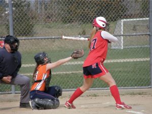 Catcher prepares for the pitch.