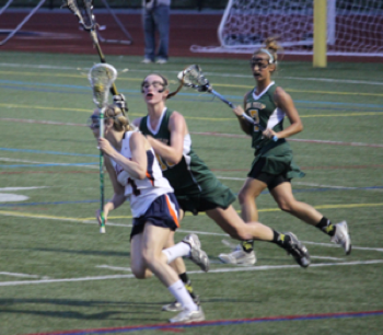 KP defenders try to stop a Walpole attack in the first tournament game