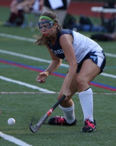 a Porkers forward recieves a pass from a nearby teammate.