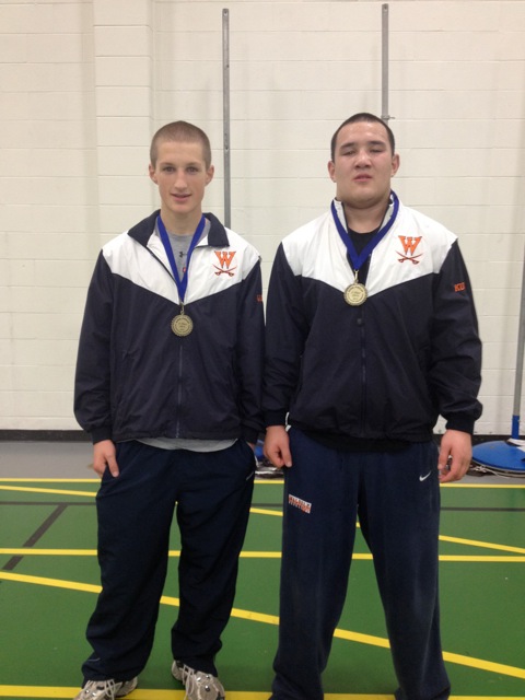 Two Walpole Wrestlers pose after winning the Jeff Parker Memorial Tournament. 