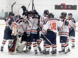 Boys Hockey celebrates win.