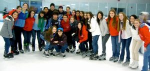 The Exchange students pose for a photo at a skating rink. 