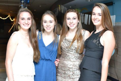 Students smile for a picture at the second annual Winter Ball.
