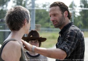 Rick and Carl console Carol
