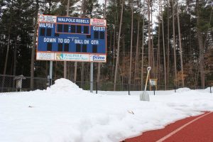 Snow at Walpole High threatens the start of Spring sports
