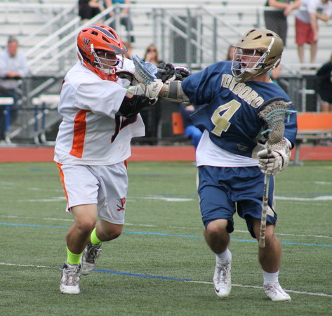 Walpole defender checks a Foxboro attack. 