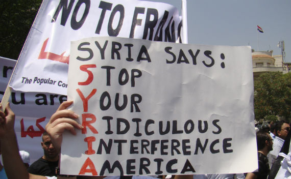 Syrian citizens protest against US involvement in their country.