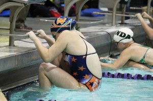 Walpole swimmer gets ready to take off.