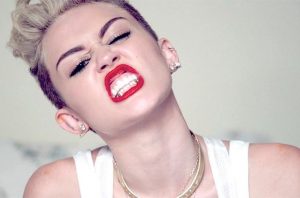 Miley Cyrus bares her teeth at criticism.