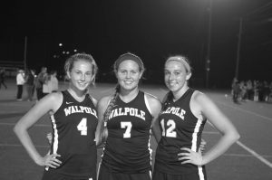 The three Field Hockey captains pose for a photo.
