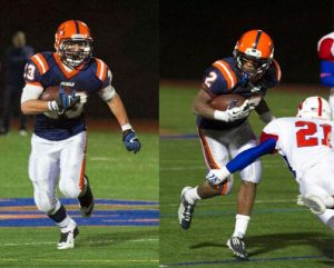 Walpole's sophomore runningback carrying the ball against rival, Natick.