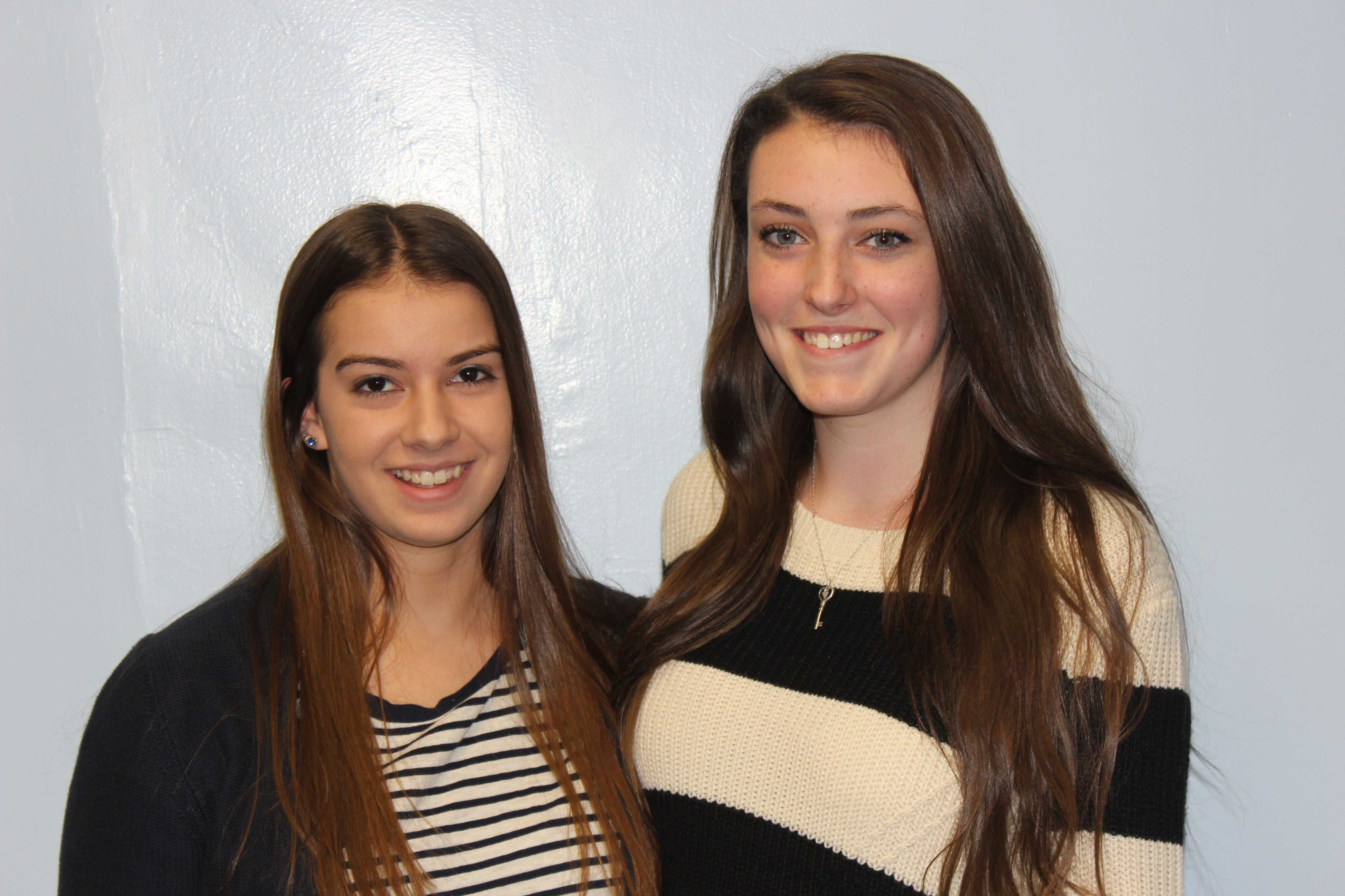 The Gymnastics Captains pose for a photo.