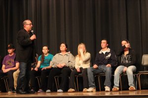 Spinnato talks to the students on stage.