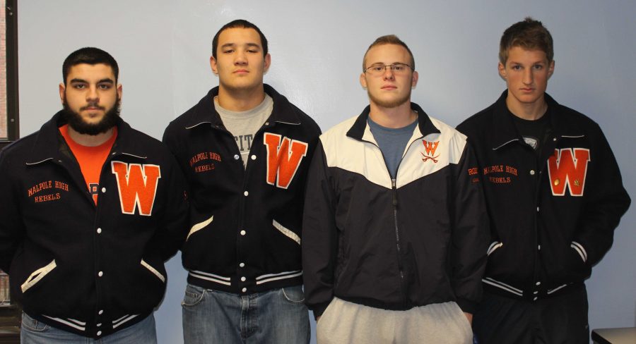 The Wrestling captains pose for a photo.
