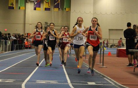 Walpole runners battle for first against Natick