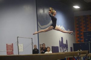 Walpole Freshman performs on Beam