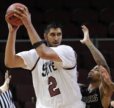 New Mexico State center Sim Bhullar looks to stage an upset over the Aztecs.