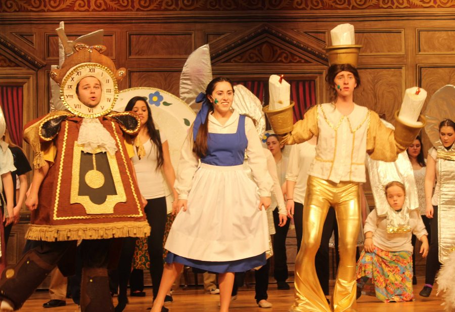 Students perform in Beauty and the Beast.  