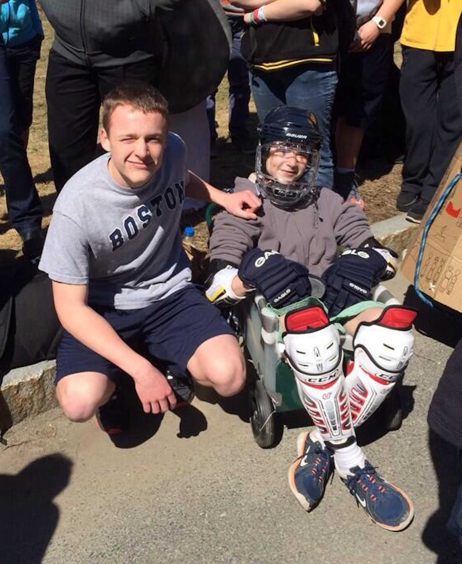 Walpole students rest in between the chariot races.