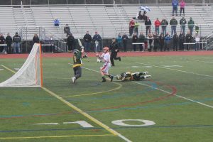 A Walpole attack scores one of his three goals on the day. 