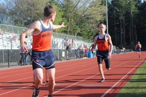 Although having the lead going into the third lap, the Walpole Boys 4x400 loses to Natick.