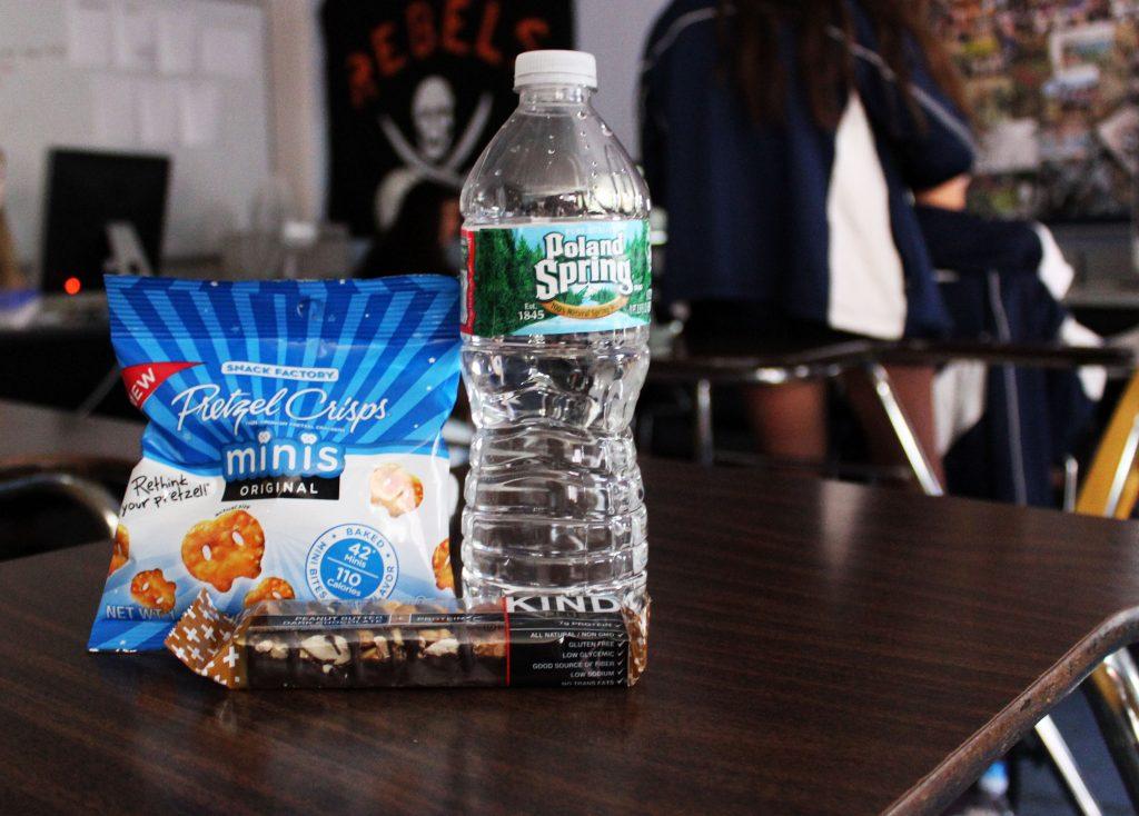 A student enjoys a snack during the ten minute snack time break. 