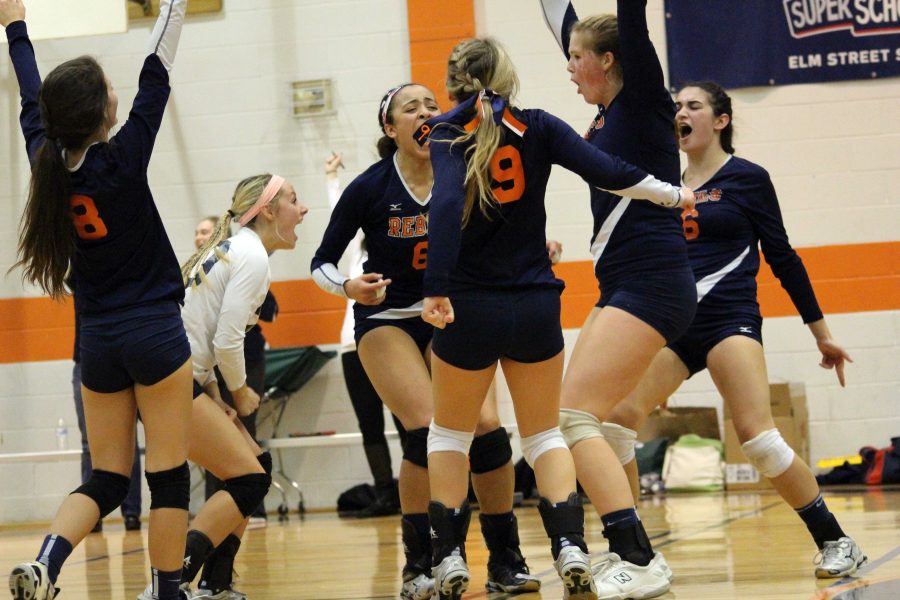 Rebels celebrate a point during postseason play.