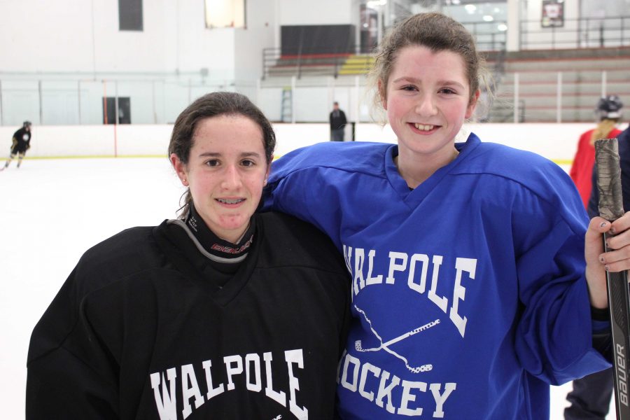 Eighth graders on Walpole Girls Hockey take a break from practice on Saturday, January 24.