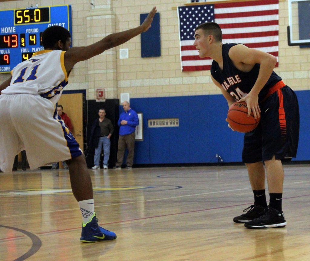 A Walpole athlete looks for an open teammate.