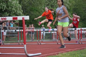 Middle school athlete chases the competition.