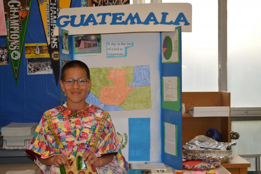 Sixth grade student presents his project on Guatemala on May 21, 2015