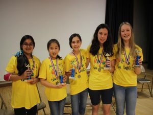 The "Rockin' Readers" team celebrate their First Place finish in the Johnson Middle School's Battle of the Books  (Photo/ Brenna Manning). 