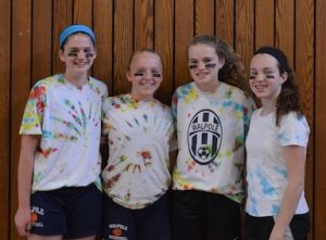 Seventh graders at Johnson Middle School pose for a team picture after winning the 3v3 Tournament