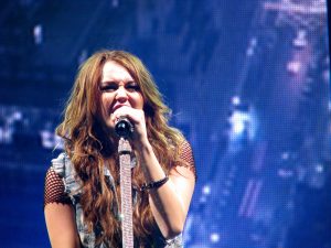 Miley Cyrus' Wonder World Tour began her transition from child star to edgy singer