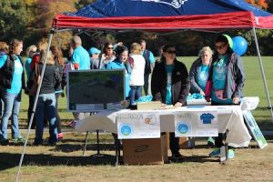 Community members help raise money to build the TEC playground at the Walk N' Roll on October 17. 