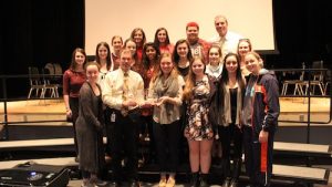 The Fire Within club poses with Principal Imbusch and their national award.