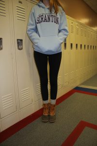 A comfortable outfit, such as leggings and a sweatshirt, pictured here, is a popular choice for many Walpole High students.