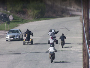 Screenshots of Walpole Police Department surveillance footage shows Bike Life members on Renmar Avenue (Photo/Walpole Police Department). 