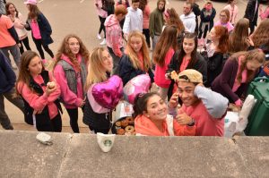 Students enjoy coffee, pastries, and more after the walk.