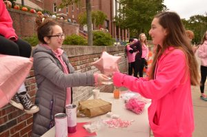 Student council member, Emma Salvatore, volunteers her time to sell raffle tickets.