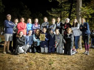 Walpole Girls XC poses with the first place plaque after the meet (Photo/ David Forester).