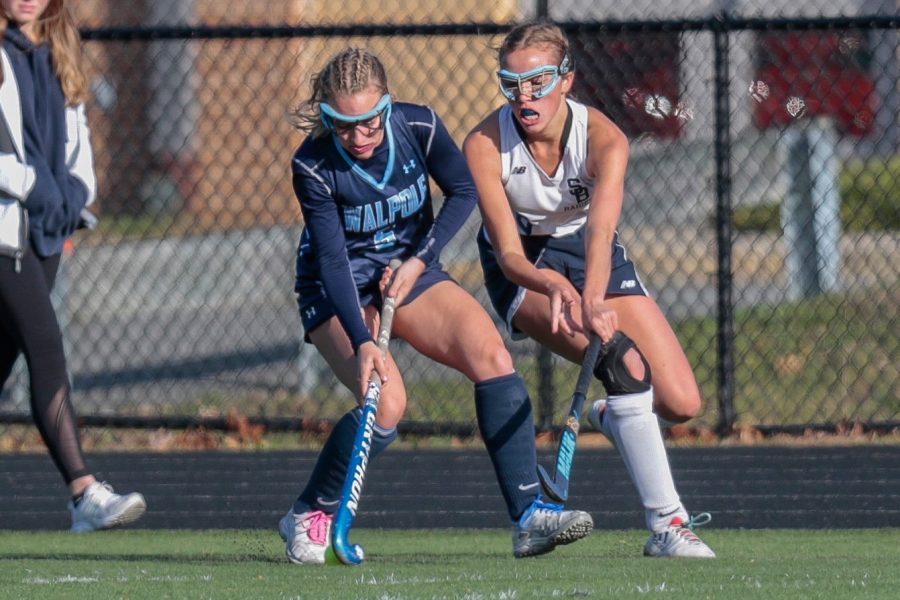 Walpole Sophia Pacella battles to keep possession against a Somerset-Berkley player.