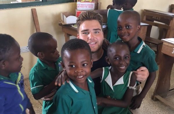 Ferraro spends time with young children in Ghana, where he spent this past summer.